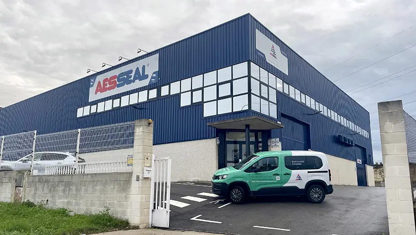 AESSEAL Tarragona premises with an electric van parked out front.