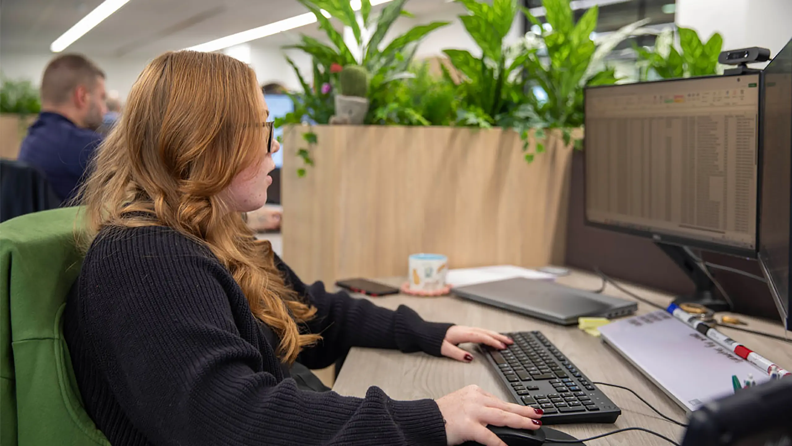 An employee at their desk.