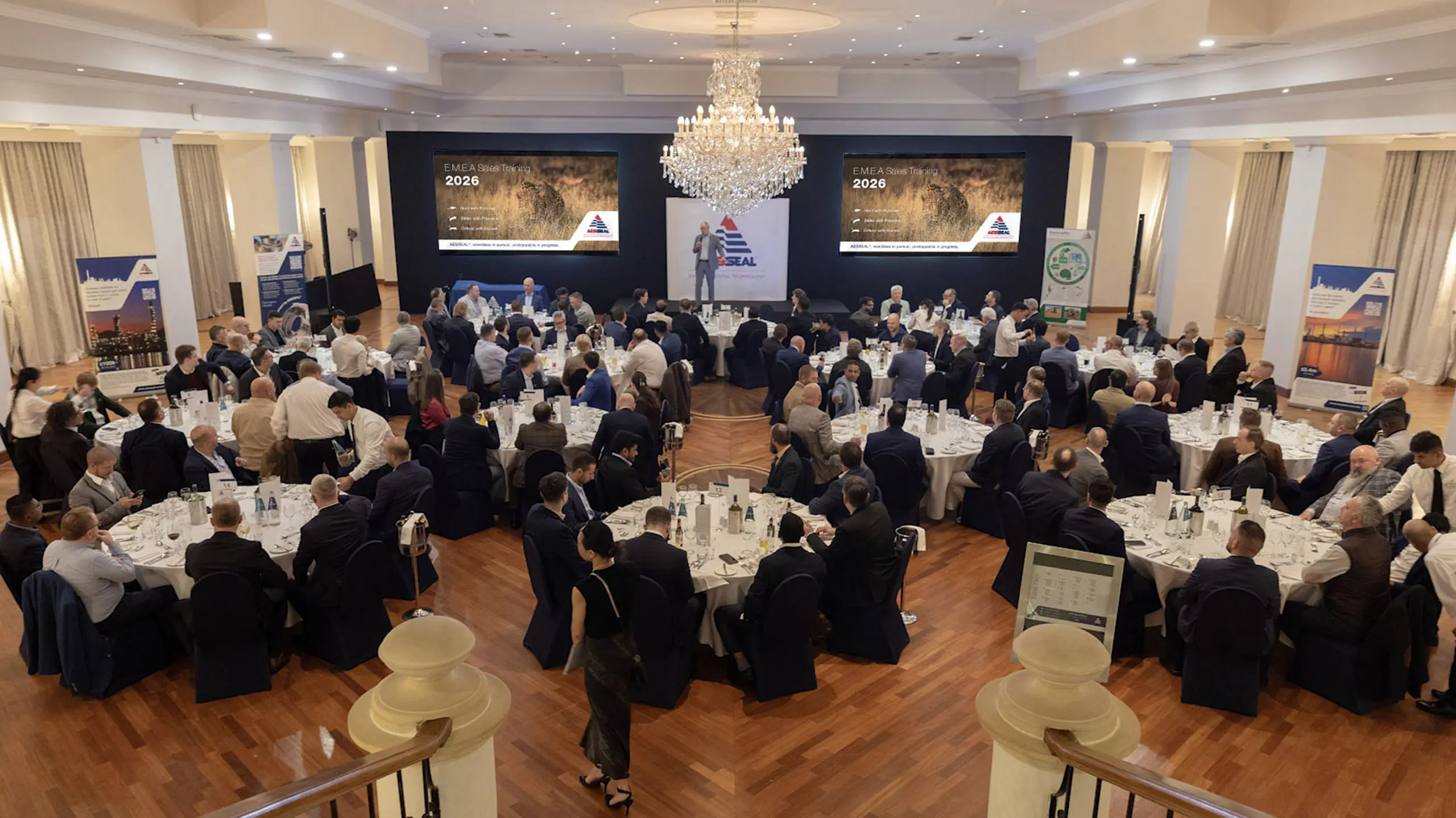 EMEA employees in a gala hall for the 2026 Sales Conference. 