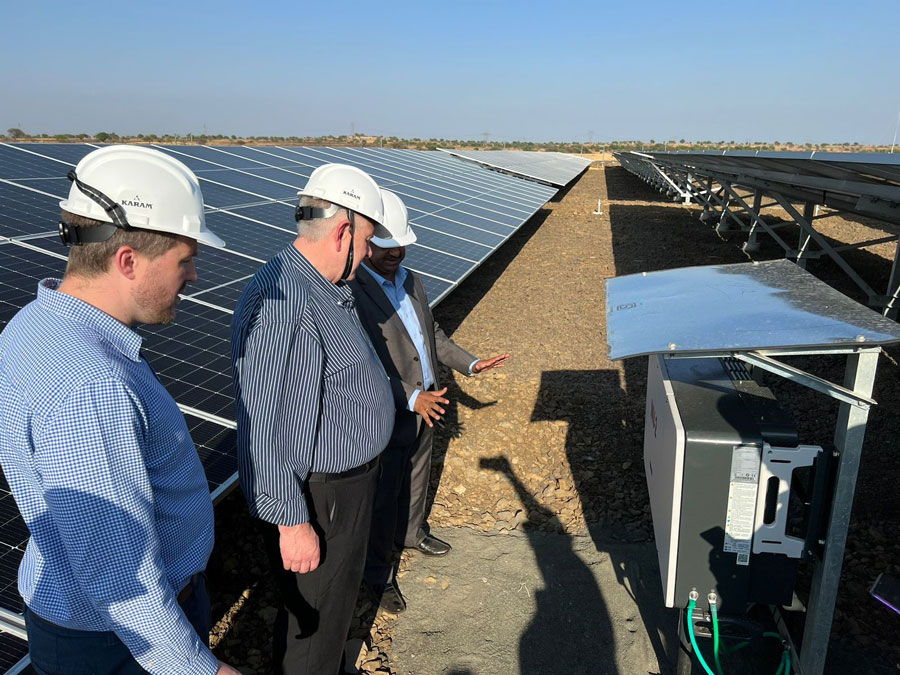 Workers Installing solar farm in India