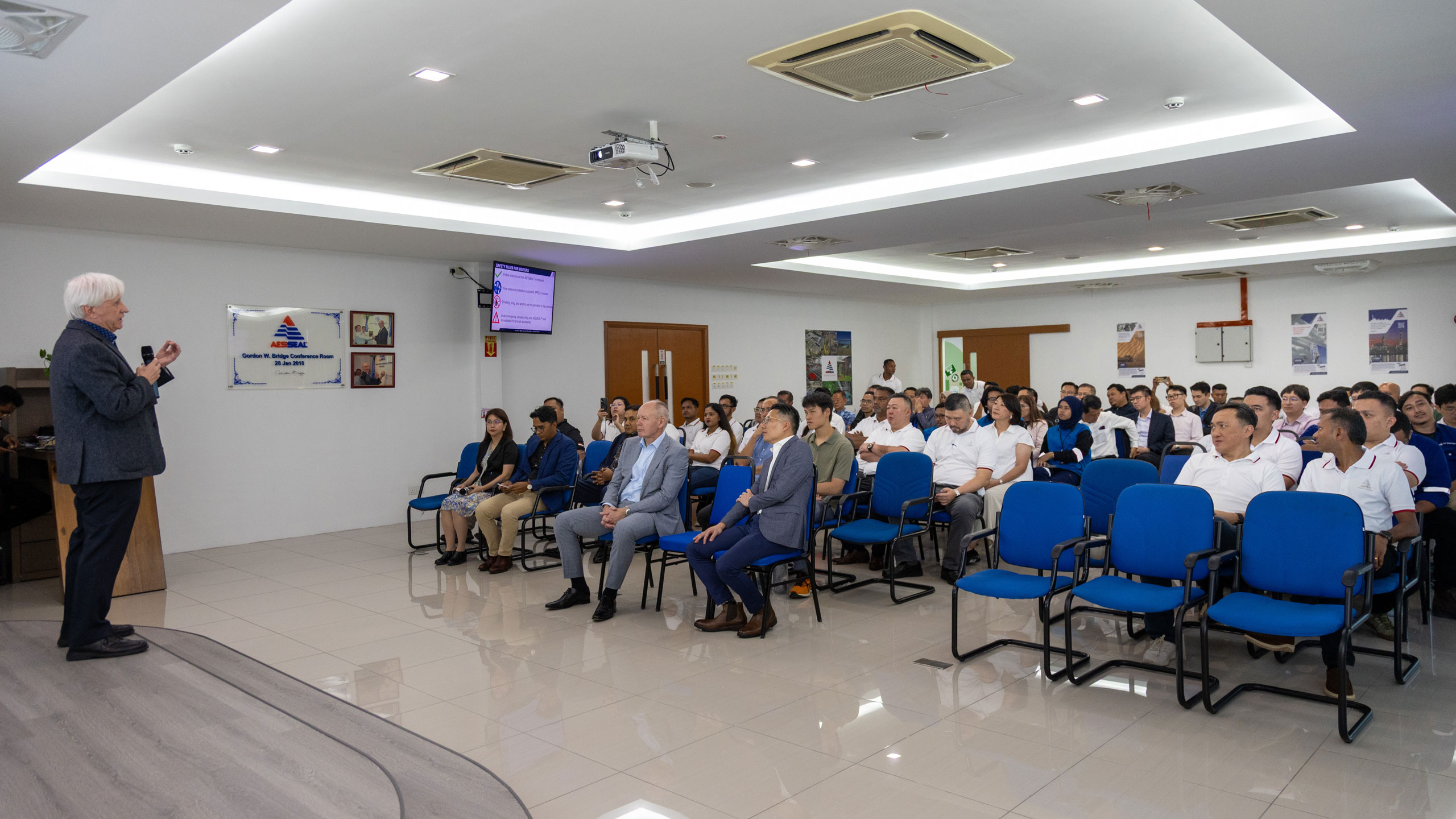 Chris Rea giving a speech in Malaysia HQ