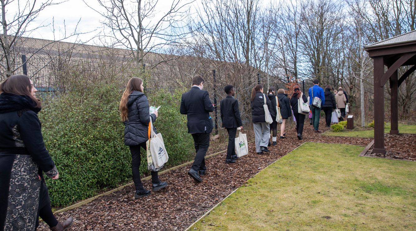 Students walking around the AESSEAL Treewalk