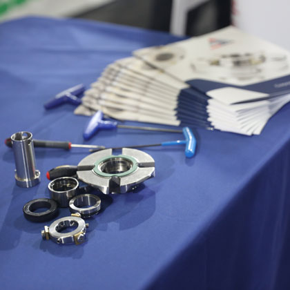 Disassembled Mechanical Seal at booth with tools