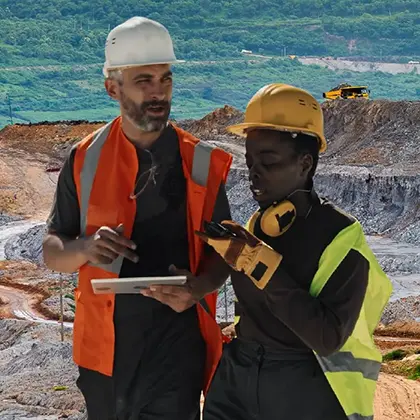 Mining workers discussing a job
