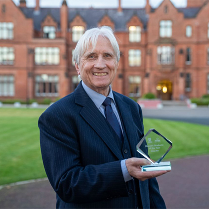 Chris Rea Collecting Queens Award from University of Belfast